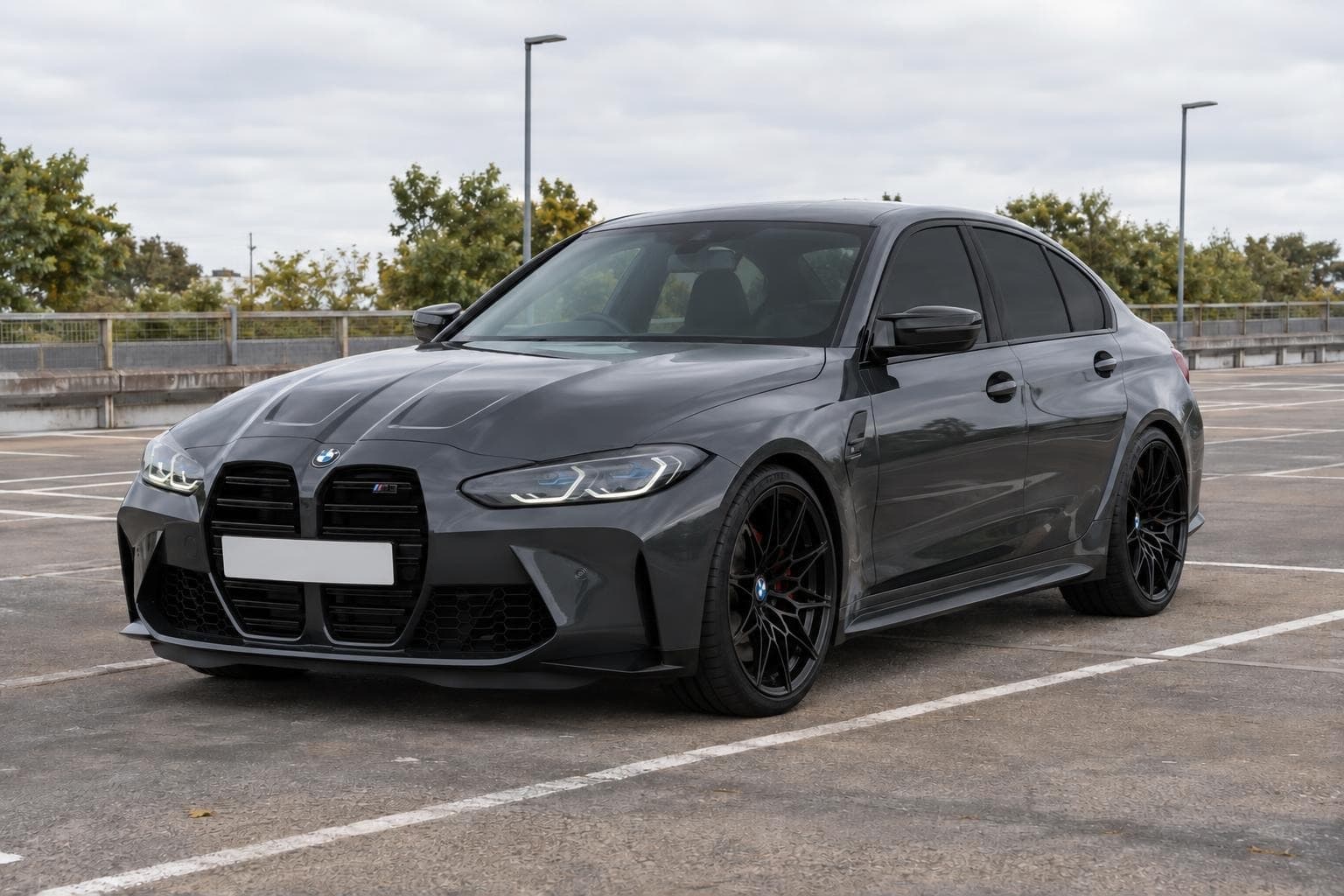 BMW M3 G80, stock and Black wheels and tint, after